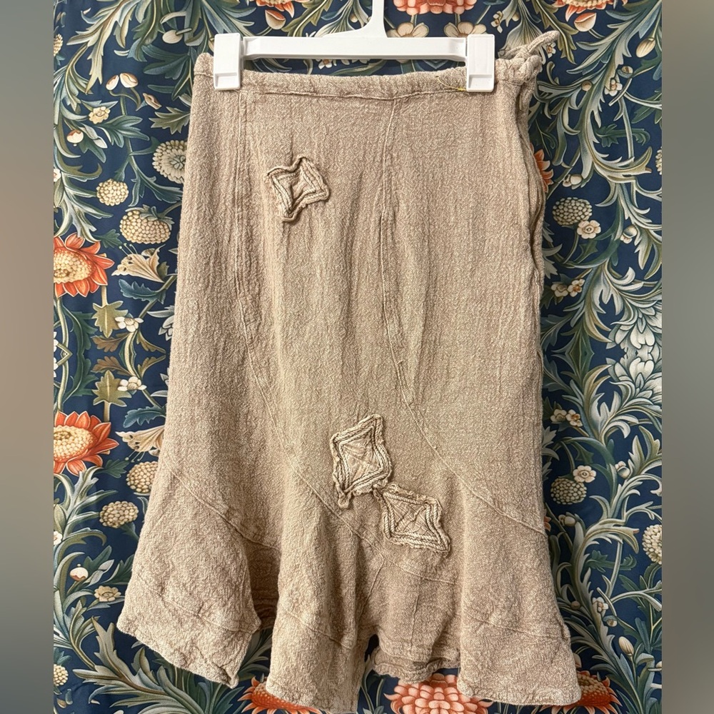 Elegant Beige Skirt with Unique Embellishments